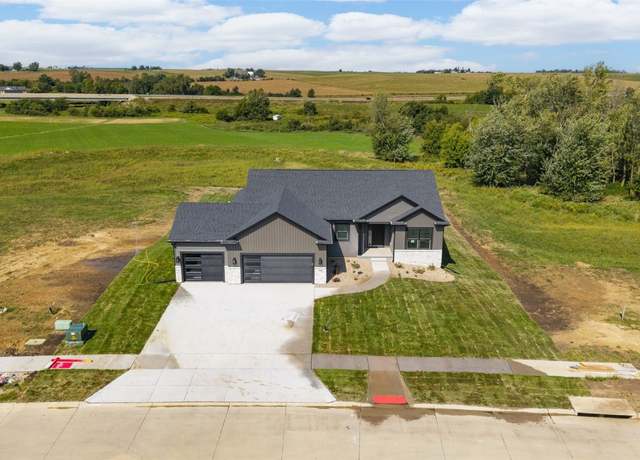Property at 7608 Country Ridge Dr NW, Cedar Rapids, IA 52405, 5 beds, 3 baths