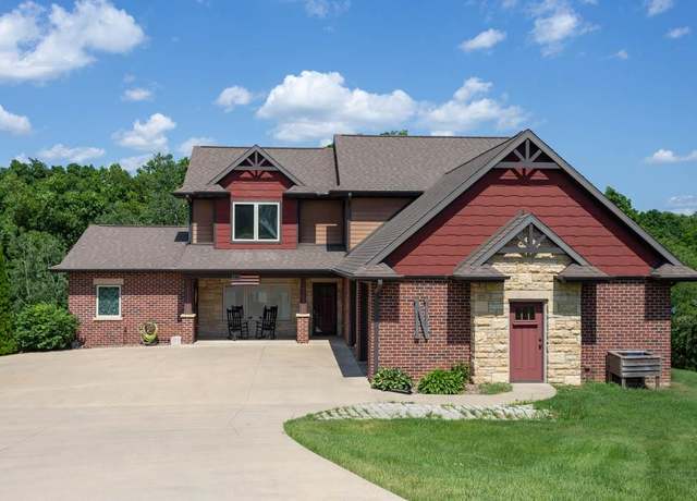 Property at 15261 Wood Vale Ct, Peosta, IA 52068, 4 beds, 3.5 baths