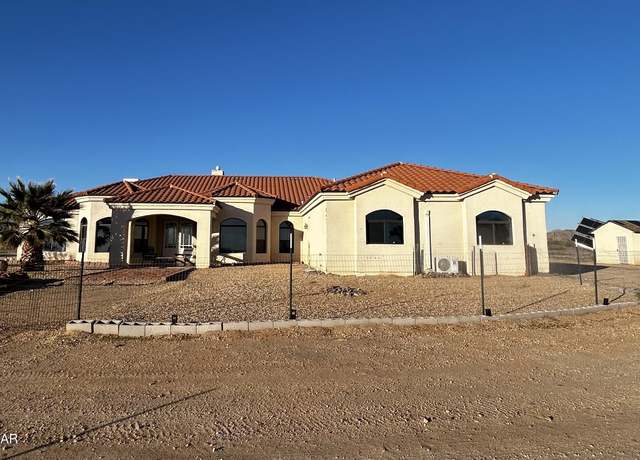 Property at 21038 S Cheyenne Rd, Yucca, AZ 86438, 4 beds, 3 baths
