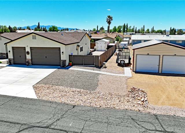 Property at 7790 E Oxbow Dr, Kingman, AZ 86401, 4 beds, 2 baths