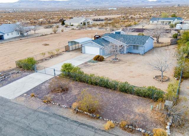 Property at 7153 W Mars Dr, Golden Valley, AZ 86413, 3 beds, 2 baths