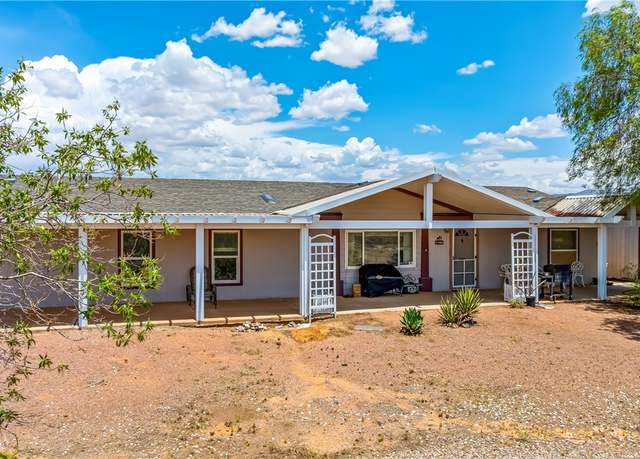 Property at 5677 W Unkar Dr, Golden Valley, AZ 86413, 3 beds, 2 baths