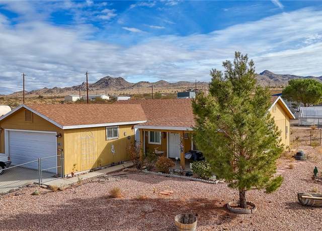 Property at 9480 N Cowbelle Ave, Kingman, AZ 86401, 3 beds, 2 baths