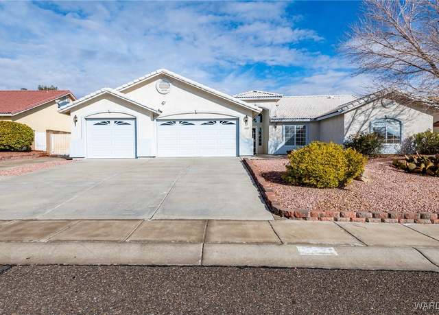 Property at 1627 E Flame Bush St, Kingman, AZ 86409, 4 beds, 2 baths