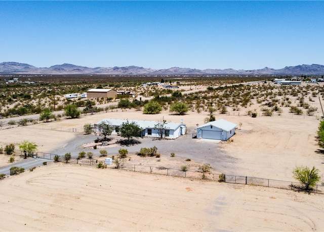 Property at 7485 W Estrella Cir, Golden Valley, AZ 86413, 4 beds, 2 baths