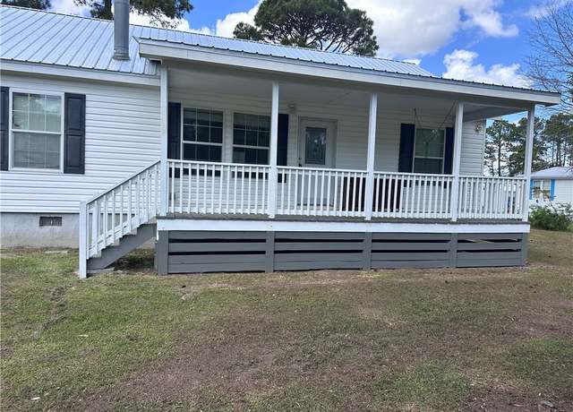 Property at 1077 Polson Cir NE, Shellman Bluff, GA 31331, 3 beds, 2 baths