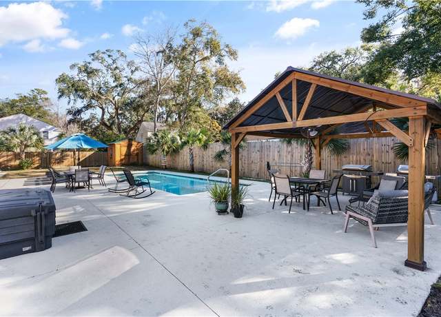 Property at 303 Wymberly Rd, St Simons Island, GA 31522, 5 beds, 3.5 baths