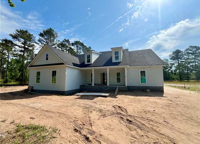 Property at 1110 Village Green Dr NE, Townsend, GA 31331, 3 beds, 2.5 baths