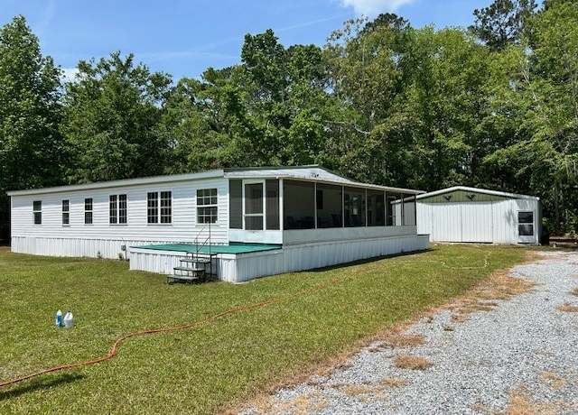Property at 1179 Floyd Dr NE, Townsend, GA 31331, 4 beds, 2.5 baths