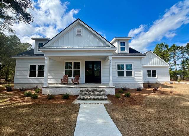 Property at 1111 N Marsh Hen Rd NE, Townsend, GA 31331, 3 beds, 2 baths
