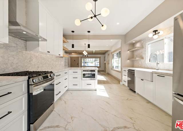 Property at 1558 W 47th St, Los Angeles, CA 90062, 5 beds, 3 baths