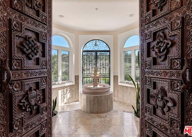 Property at 10827 Pacific View Dr, Malibu, CA 90265, 5 beds, 4.5 baths