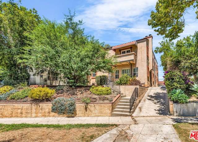 Property at 1073 S Mansfield Ave, Los Angeles, CA 90019, 6 beds, 4 baths