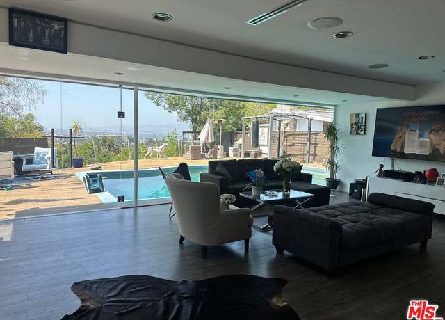 Property at 7241 Woodrow Wilson Dr, Los Angeles, CA 90068, 2 beds, 2 baths