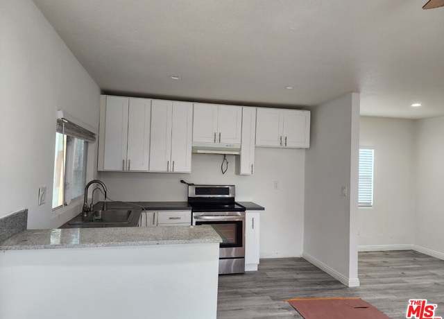 Property at 1166 E Adams Blvd, Los Angeles, CA 90011, 5 beds, 3 baths