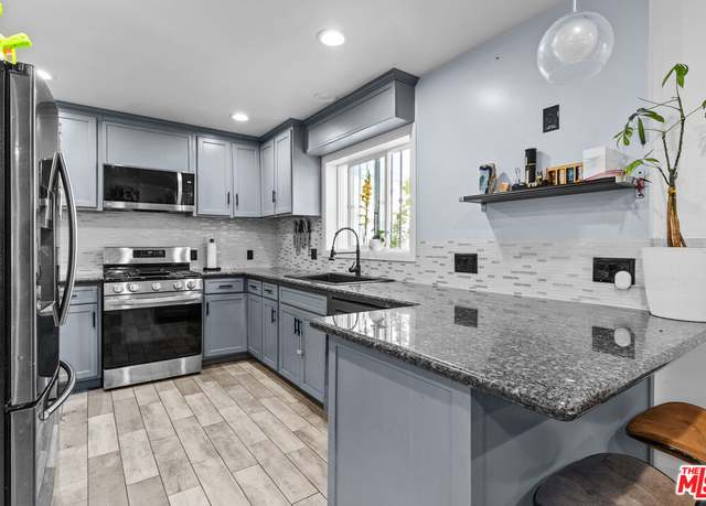 Property at 2205 S Burnside Ave, Los Angeles, CA 90016, 5 beds, 4 baths