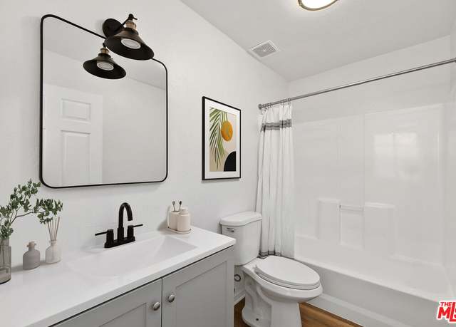 Property at 8620 S Main St, Los Angeles, CA 90003, 6 beds, 4 baths