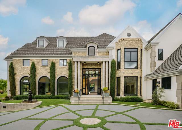 Property at 20608 Chatsboro Dr, Woodland Hills, CA 91364, 6 beds, 7.5 baths