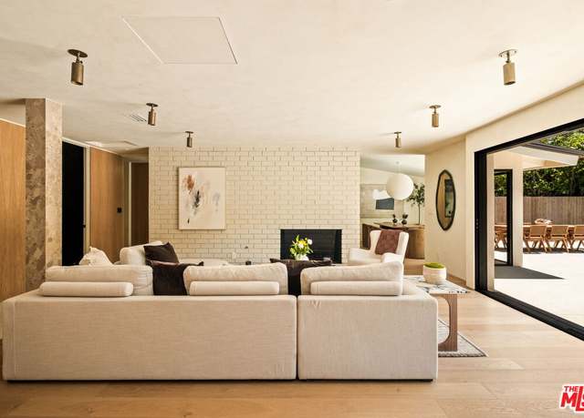 Property at 16632 Park Lane Cir, Los Angeles, CA 90049, 5 beds, 5 baths