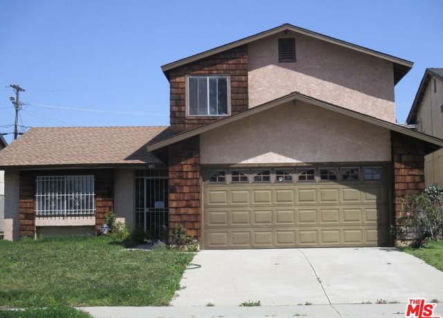 Property at 801 W 124th St, Los Angeles, CA 90044, 3 beds, 2.5 baths