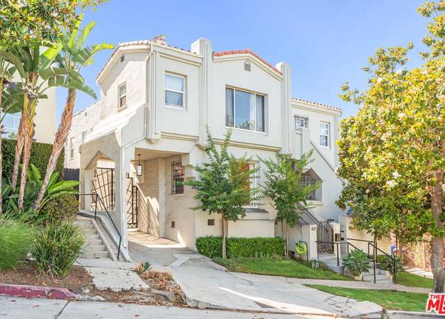 Property at 1119 1121 S Orange Dr, Los Angeles, CA 90019, 4 beds, 2 baths