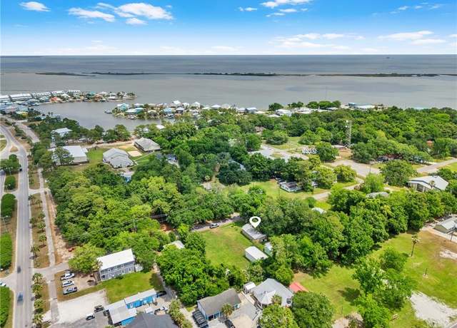 Property at 915 Cadillac Ave, Dauphin Island, AL 36528, 4 beds, 3 baths