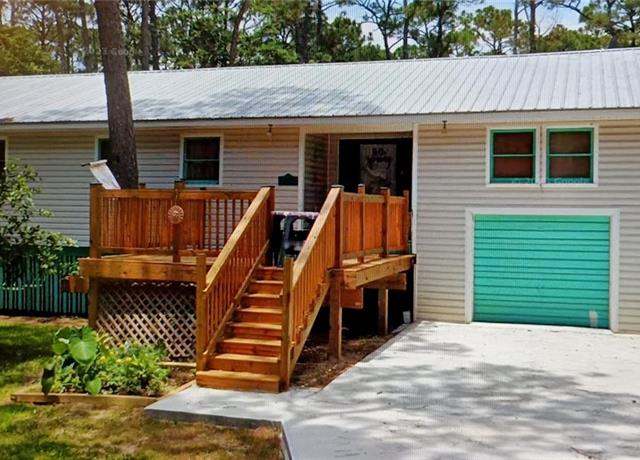 Property at 1114 Napoleon Pl, Dauphin Island, AL 36528, 5 beds, 3 baths