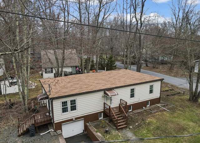 Property at 5007 Holiday Dr, Pocono Summit, PA 18346, 3 beds, 2 baths