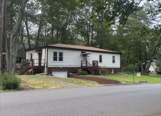 Property at 5007 Holiday Dr, Pocono Summit, PA 18346, 3 beds, 2 baths