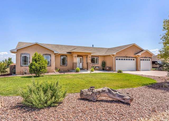 Property at 599 E Tanager Dr, Pueblo West, CO 81007, 5 beds, 3 baths