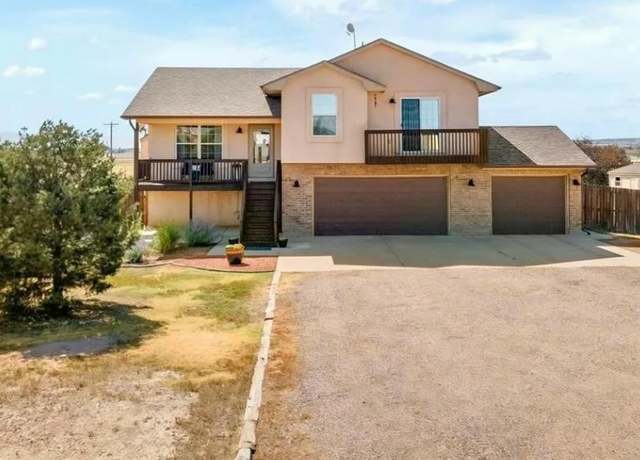 Property at 1113 N Calico Rock Ln, Pueblo West, CO 81007, 5 beds, 3 baths