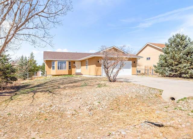 Property at 647 S Watermelon Dr, Pueblo West, CO 81007, 4 beds, 3 baths