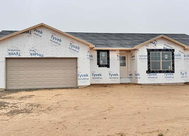 Property at 803 N Ravencliff Dr, Pueblo West, CO 81007, 4 beds, 2 baths