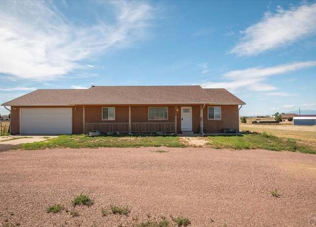 Property at 1434 E Purcell Blvd, Pueblo West, CO 81007, 4 beds, 3 baths