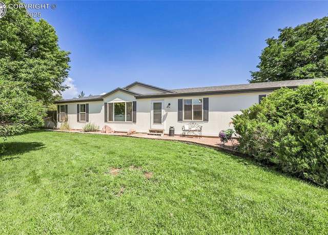 Property at 1431 Pine St, Canon City, CO 81212, 4 beds, 2 baths