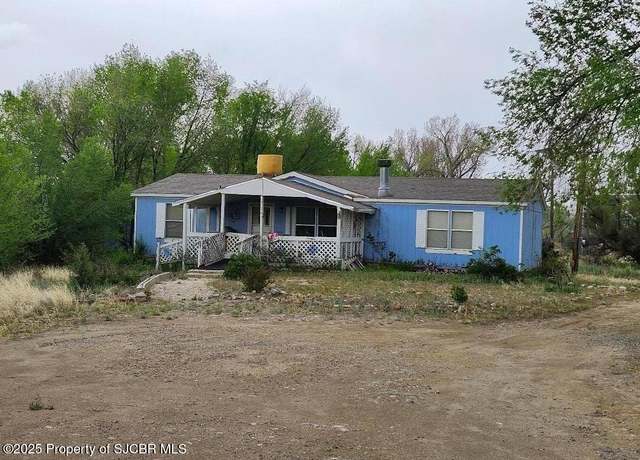Property at 911 NM 516, Aztec, NM 87410, 3 beds, 2 baths