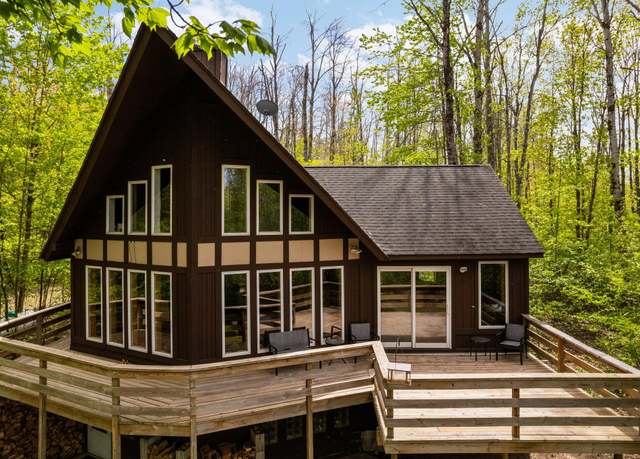 Property at 6192 Wilderness Dr, Mancelona, MI 49659, 3 beds, 2 baths
