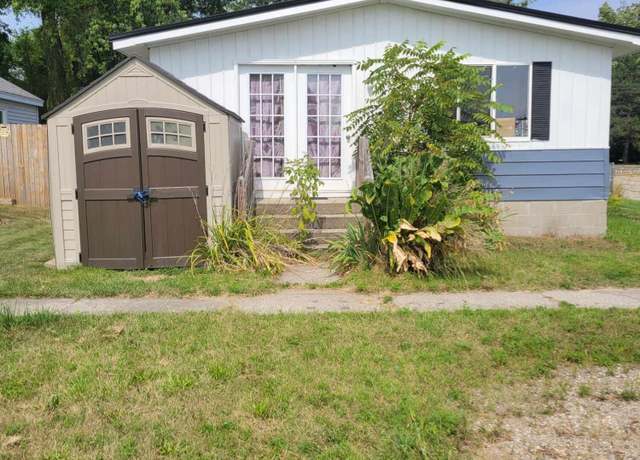 Property at 100 Mckinley St, Houghton Lake, MI 48629, 3 beds, 2 baths