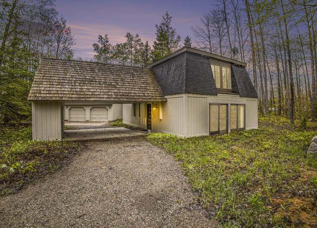 Property at 10401 Country Club Dr, Mancelona, MI 49659, 3 beds, 2 baths