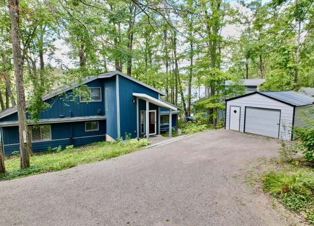 Property at 5408 E Martin Lake Dr, Gaylord, MI 49735, 4 beds, 2 baths