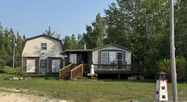 Photo of 3981 Pointe Dr, Carp Lake, MI 49718