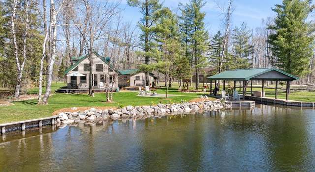 Photo of 8282 Devils Elbow Dr, Brutus, MI 49716