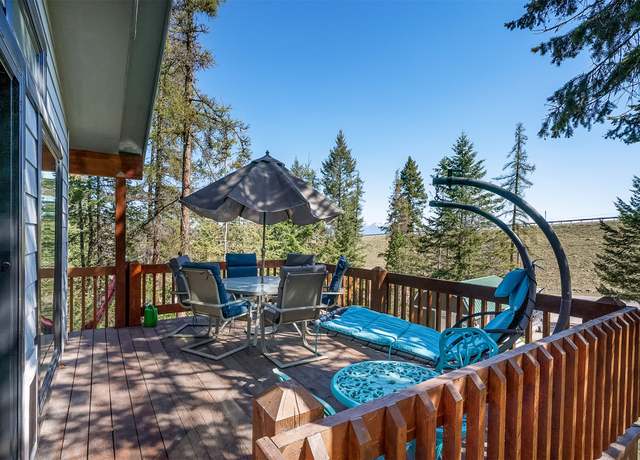 Property at 103 Tamarack Woods Dr, Lakeside, MT 59922, 3 beds, 2 baths