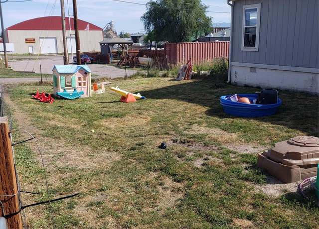 Property at 1005 Main St, Polson, MT 59860, 4 beds, 2 baths