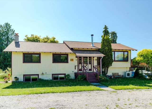 Property at 1108 9th St E, Polson, MT 59860, 4 beds, 3 baths