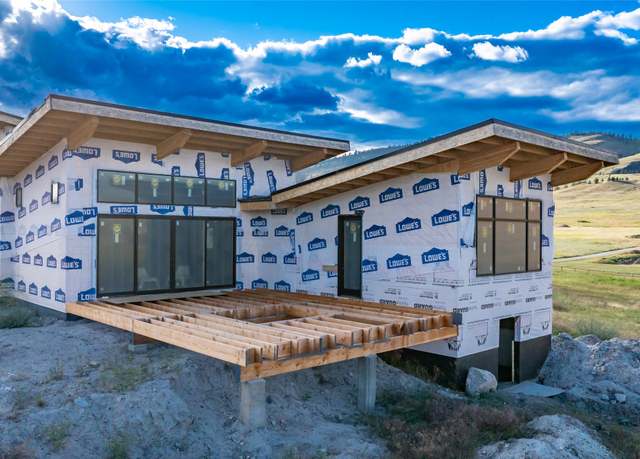 Property at 25978 Caye Dr, Elmo, MT 59915, 3 beds, 2.5 baths