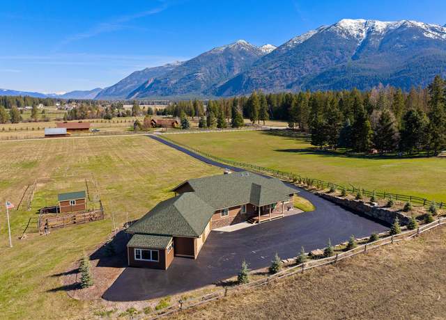 Property at 100 Liahona Ln, Kalispell, MT 59901, 4 beds, 3 baths