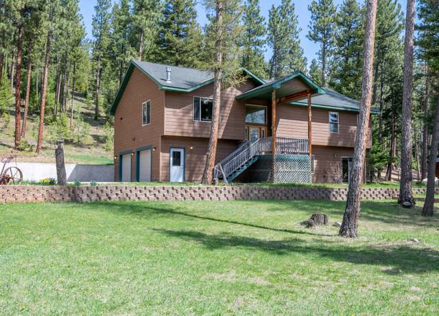 Property at 1701 Bear Creek Rd, Potomac, MT 59823, 5 beds, 3 baths