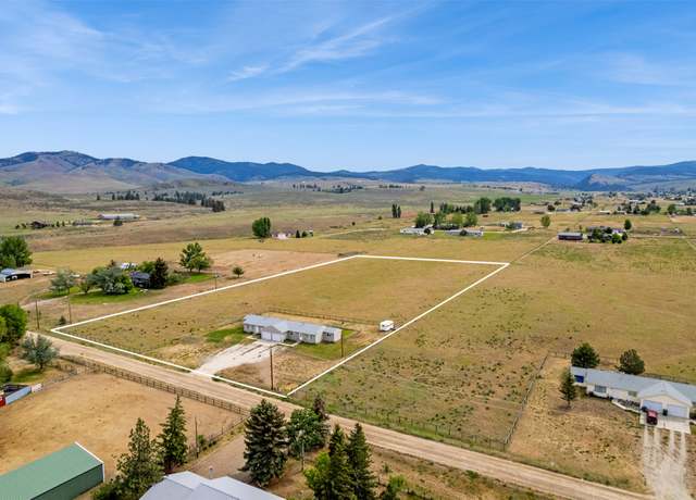 Property at 5642-5644 Meadowview Dr N, Florence, MT 59833, 4 beds, 2 baths
