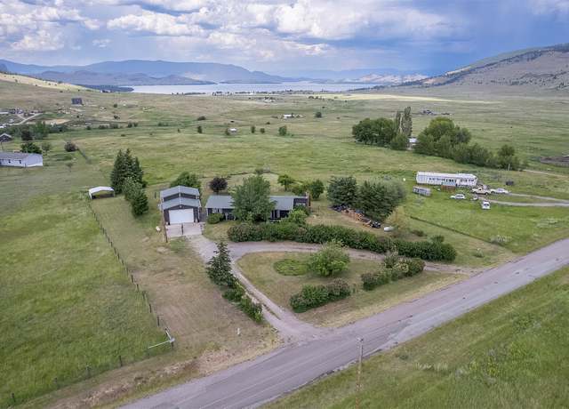 Property at 30543 Walking Horse Ln, Big Arm, MT 59910, 4 beds, 3 baths